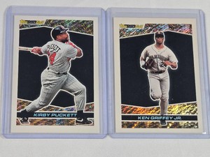 Lot of 2 Baseball Cards Featuring Kirby Puckett and Ken Griffey Jr. Black Gold Series.