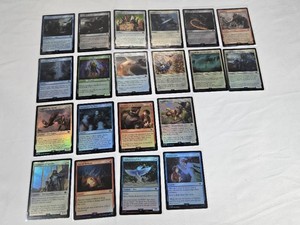Lot of 20 Magic The Gathering Foil Cards including Bewitching Leechcraft, The Black Breath, Soothing of Smeagol, Galadhrim Guide