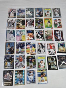 Lot of Mixed Baseball Cards Featuring Ken Griffey Jr., Barry Bonds, Nolan Ryan, and Vladimir Guerrero Jr. Including Rookie Cards and Star Players
