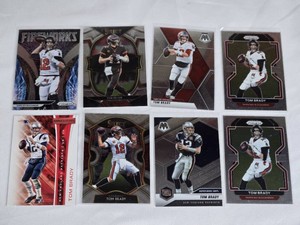 Lot of 8 Tom Brady Football Cards including Prizm Fireworks and Select Super Bowl MVPs.