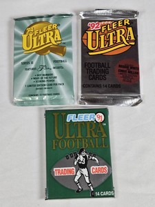 Lot of 3 Unopened Packs of 91, 92, 94 Fleer Ultra Football Cards.