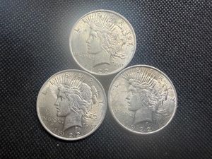 Three 1922 Brillant Uncirculated Peace Silver Dollars