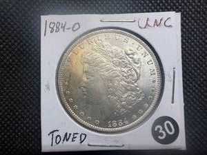 1884-O Morgan Silver Dollar Marked UNC When Purchased -Toned