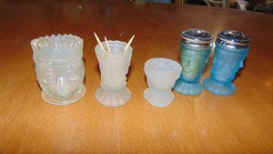 Facial Salt and Peppers and Toothpick Holders