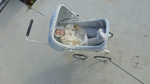 Vintage Wicker Buggy with Antique Doll