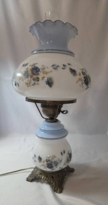 Vintage 1973 L & L Romantic Gone With the Wind Parlor Hurricane Lamp.  Blue Milk Glass, Floral Brass Base.   Lamp is 23 tall. The bottom and top both light up.