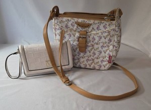 White 1981 Unionbay shoulder bag with flower print. Bag size is 9 x 8.5.   Victoria Tech Wristlet in BoneWhite with Black Piping. Bag size is 7 x 4.5.