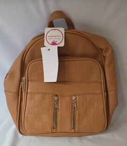 New Nadine West tan faux leather with mini backpack with a top handle and gold colored zippers. The backpack has adjustable straps and is approx. 12 x 11,