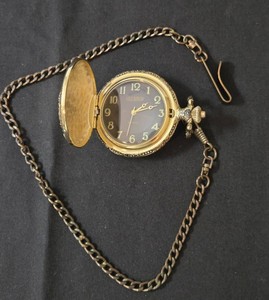 Red Ranger Quartz Pocket Watch - Working (see video).  Outside case has wildlife scenery.