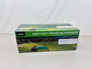 NEW In Box Orbit Traveling Lawn Sprinkler Tractor
