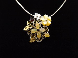 .925 Sterling Silver Garnet Accented Mother of Pearl Flower Pendant Necklace