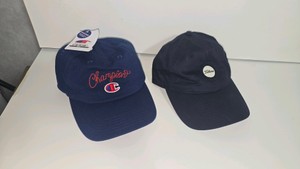 Lot 61  Lot of 2 Baseball Caps Champion Script Logo (Navy) & Titleist Circle Patch (BlackNavy)