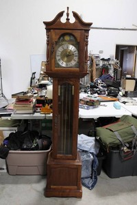 Wood-Cased Grandfather Clock With Pendulum and Weights
