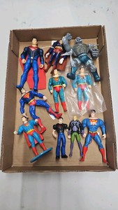 Lots of Superman action figures and villains DC doomsday  Lex Luther.