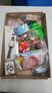 Miscellaneous mail away Evon toy lot Furby McDonalds space Disney et cetera.