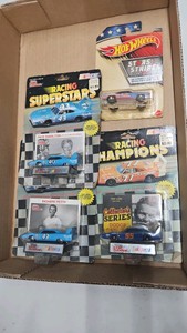 Lot of 4 164th scale dycast racing champions in Battle Hot Wheels impacted Richard petty ETC.
