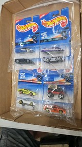 Lot of Mattel Hot Wheels 164th scale diecast cars. 8 total 2-4 car sets spy print series street beast series.
