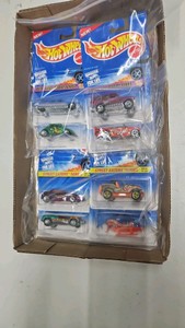 Lot of 8 164th scale Hot Wheels diecast cars. 24 car series sets biff bam boom series street eaters series.