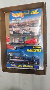 Lot of two diecast car sets action pack and long hollers drag strip cars