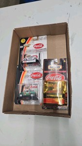 Lot of 3 164 scale diecast match box Coca Cola cars.