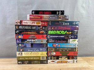 22 VHS Tape Collection - Independence Day, Armageddon, Joe Dirt, Baby Boom, Betty Boop Bad Girl, Babar, Moonraker, The Long Dark Hall, Body for LIFE, Easy Steps, A Great Day in Harlem, Etc.&nbspC