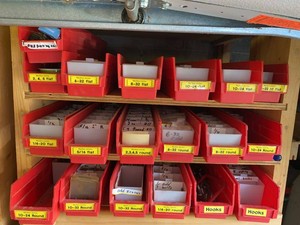 Group Assorted Machine Screws & Hooks in Red Plastic Organizer Bins