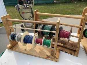 Pair of Wooden Wire Spool Racks With Assorted Electrical Wire
