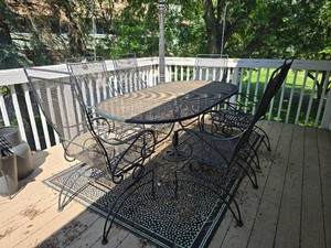 Metal Mesh Patio Dining Set with Oval Table and Six Armchairs