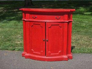 Bright Red Bow Front Accent Cabinet with Drawer and Paneled Doors