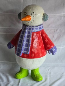 Colorful Snowman Figure with Earmuffs and Polka Dot Coat