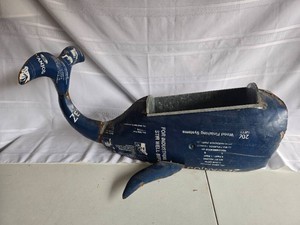 Repurposed Metal Whale Planter with Blue Advertising Graphics
