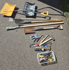 Garden and Household Tool Collection with Snow Shovels and Hand Tools