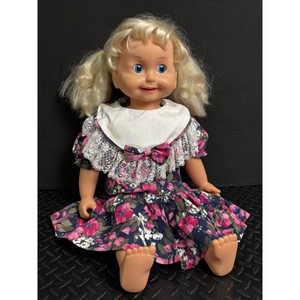 Vintage Blonde Talking Doll with Floral Dress and Pigtails