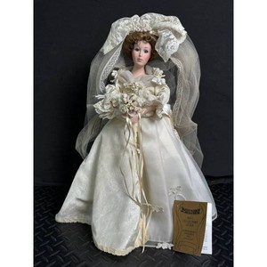 Mann Porcelain Bride Doll in Ivory Satin Gown with Veil