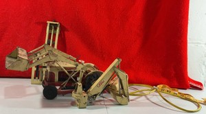 Vintage Ford Tin Toy Backhoe Yellow Cast Metal Toy Battery operated