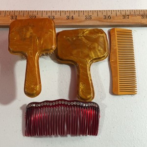 Vintage Childs size brush mirror celluloid dresser set hair comb.