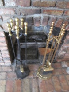 Black and Brass tone cast iron fire...