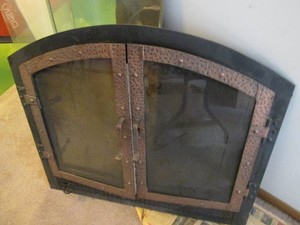 Cast Iron fireplace and glass door ...