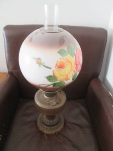 Vintage Aladdin amber-tone glass oi...