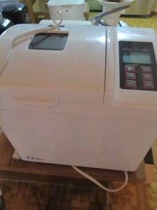 Oster digital electric bread maker...