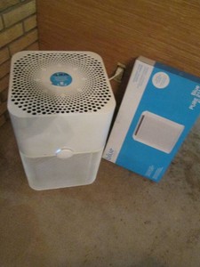 Blue air purifier with additional p...