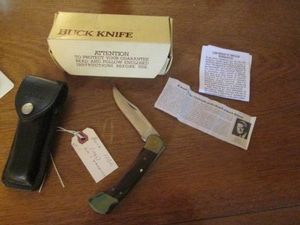 Buck knives pocket knive with leath...