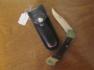 Vintage Buck pocket knife with leat...