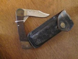 Vintage Buck pocket knife with leat...
