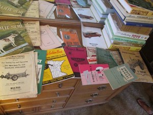 Variety of vintage books on Gasolin...