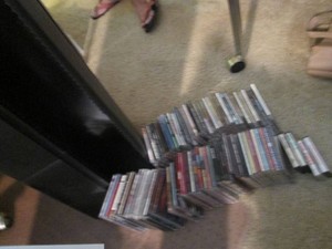 Spinning CD storage tower with coll...