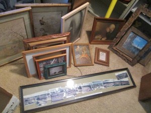 Empty photo frames, religious and a...