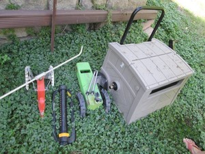 Suncast hose reel containment with ...