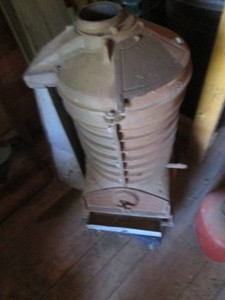 Vintage cast iron Jamesway wood sto...