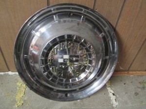Vintage hubcap wall clock...